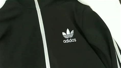 ciri jaket Adidas ori